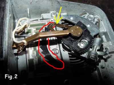 Figure 8.2 — Mécanisme interne: curseur et piste résistive du débitmètre à volet.